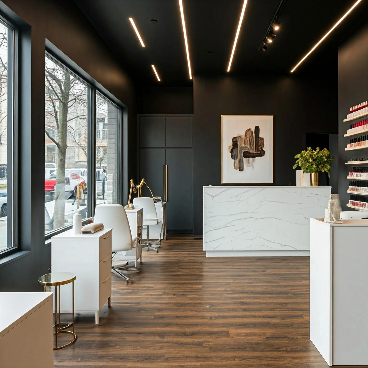 Marble reception desk beside a nail-colour wall and window manicure stations